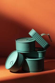 front-view-stack-blue-conserves-with-copy-space